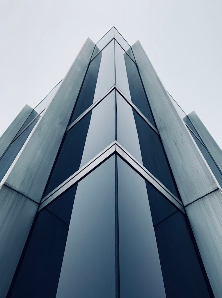 Blue Glass Walled High Rise Building